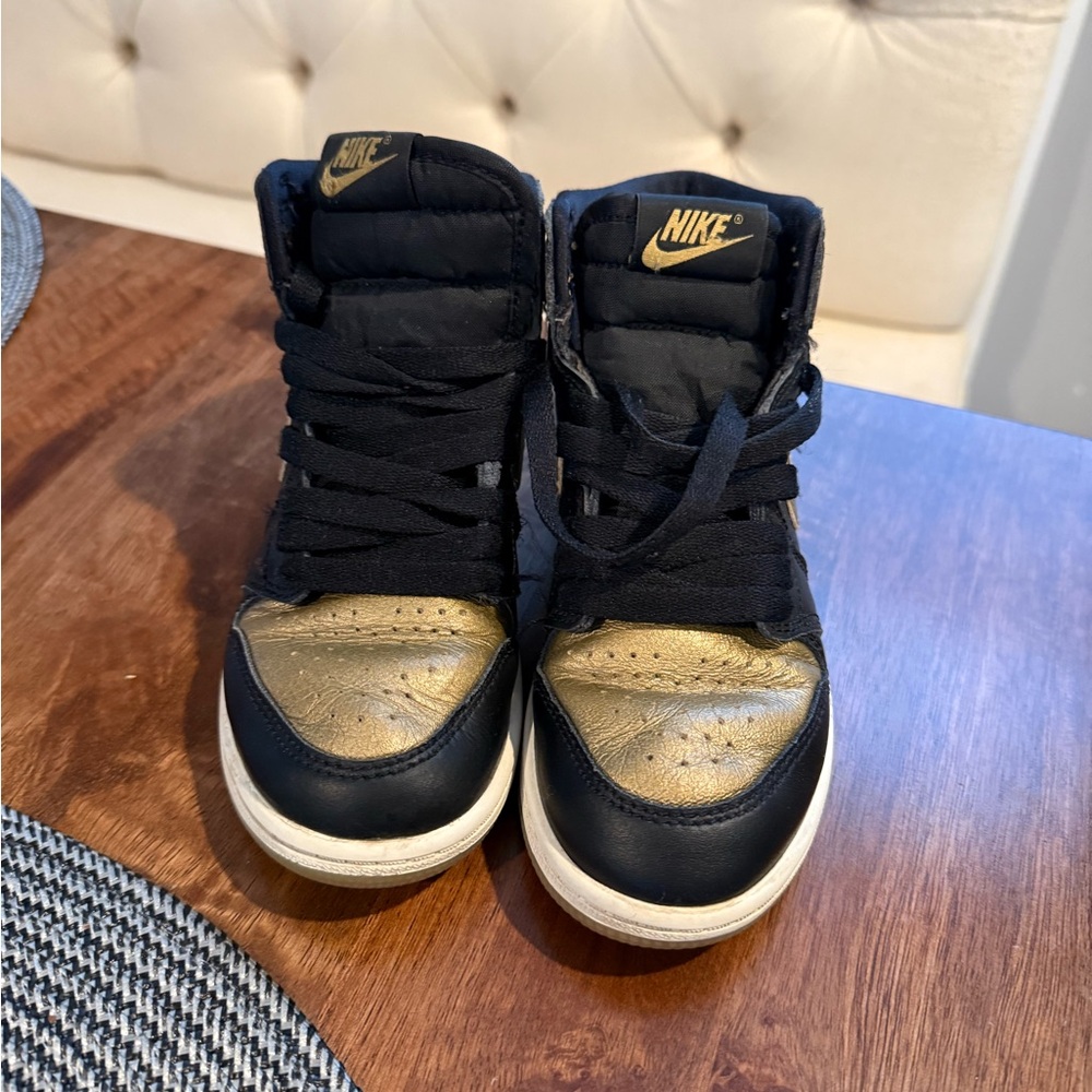 Nike Black and Gold High-Tops